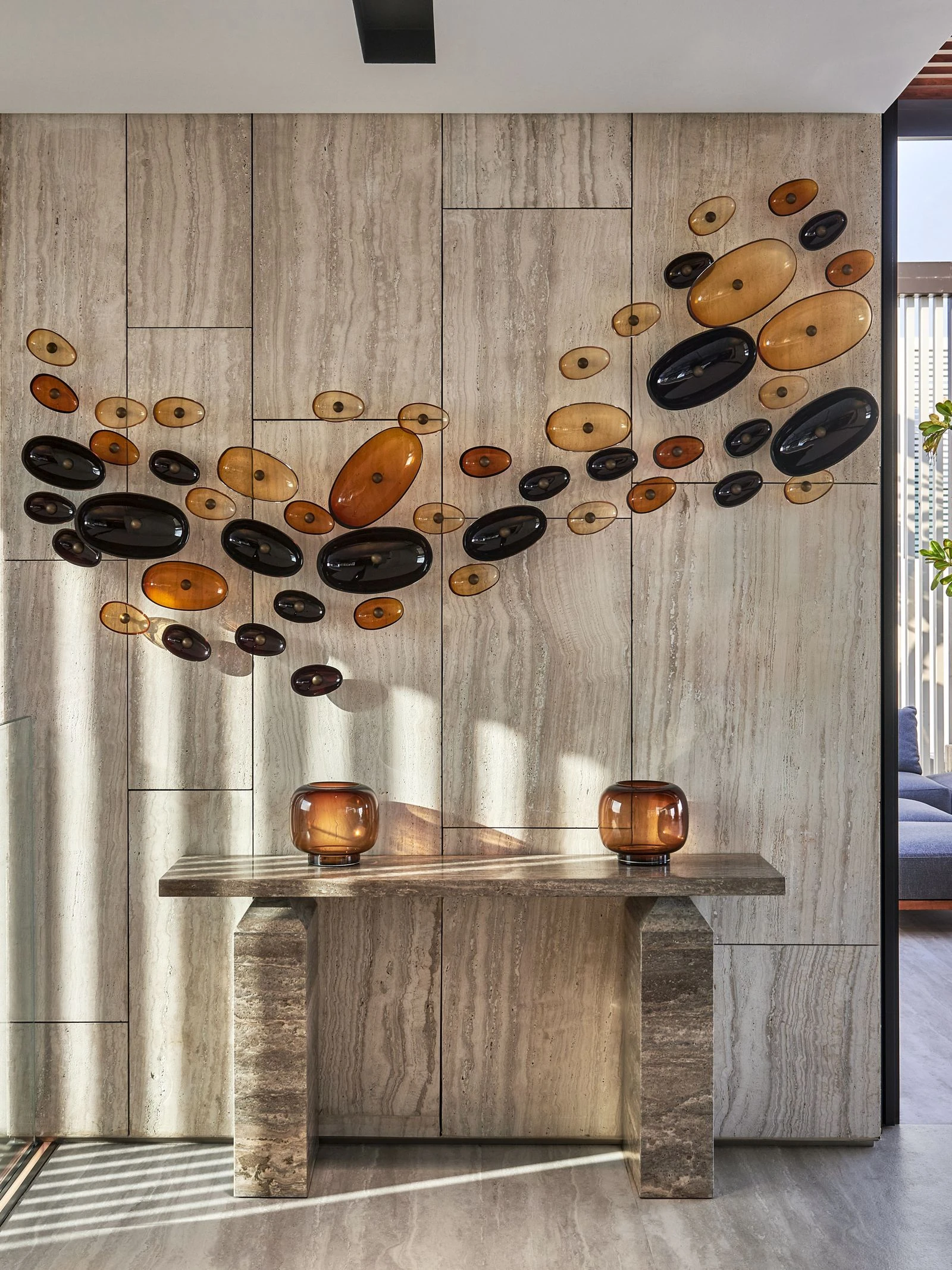 Bespoke amber glass wall art and stone console