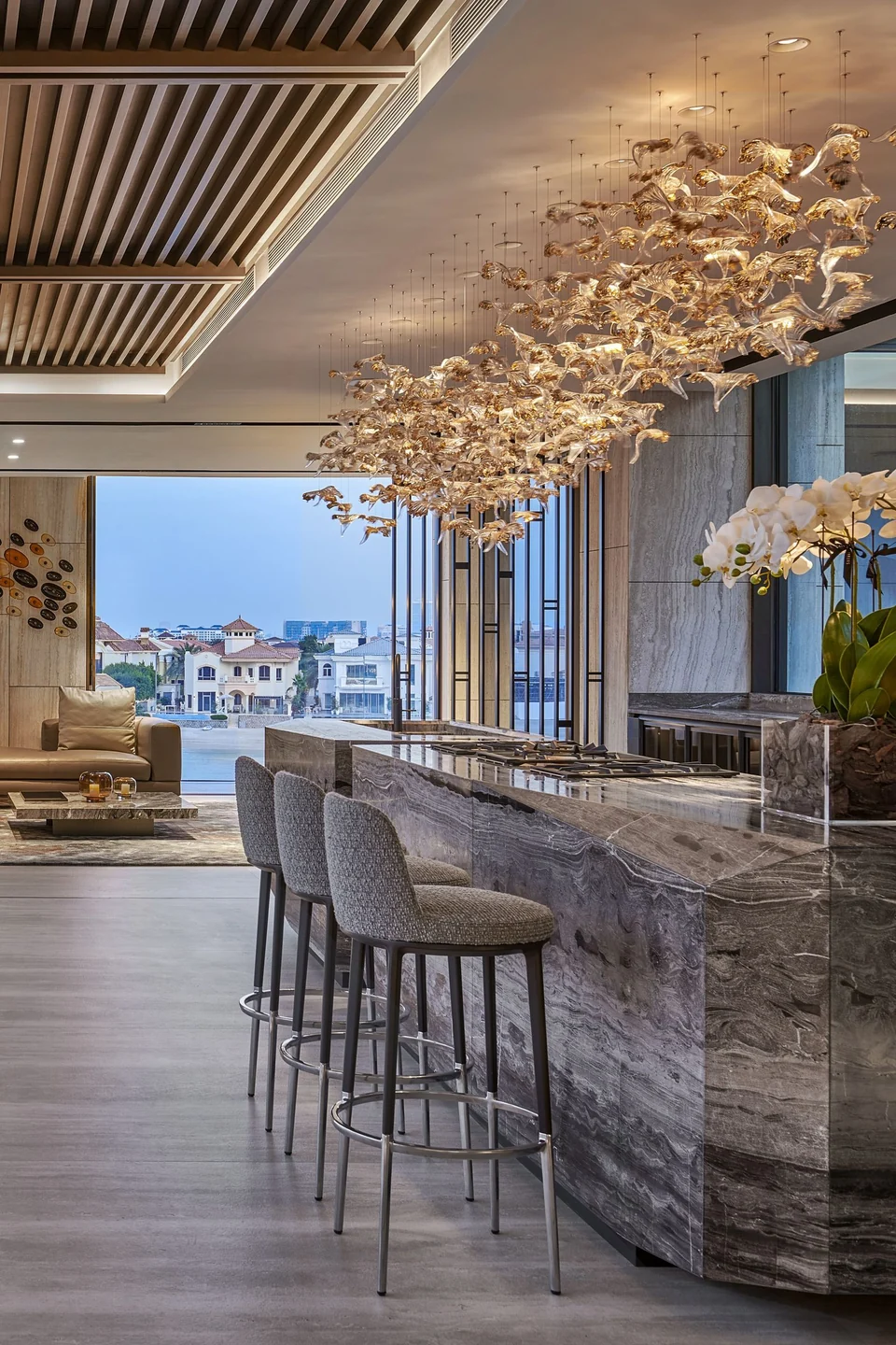 Marble kitchen island and chandelier